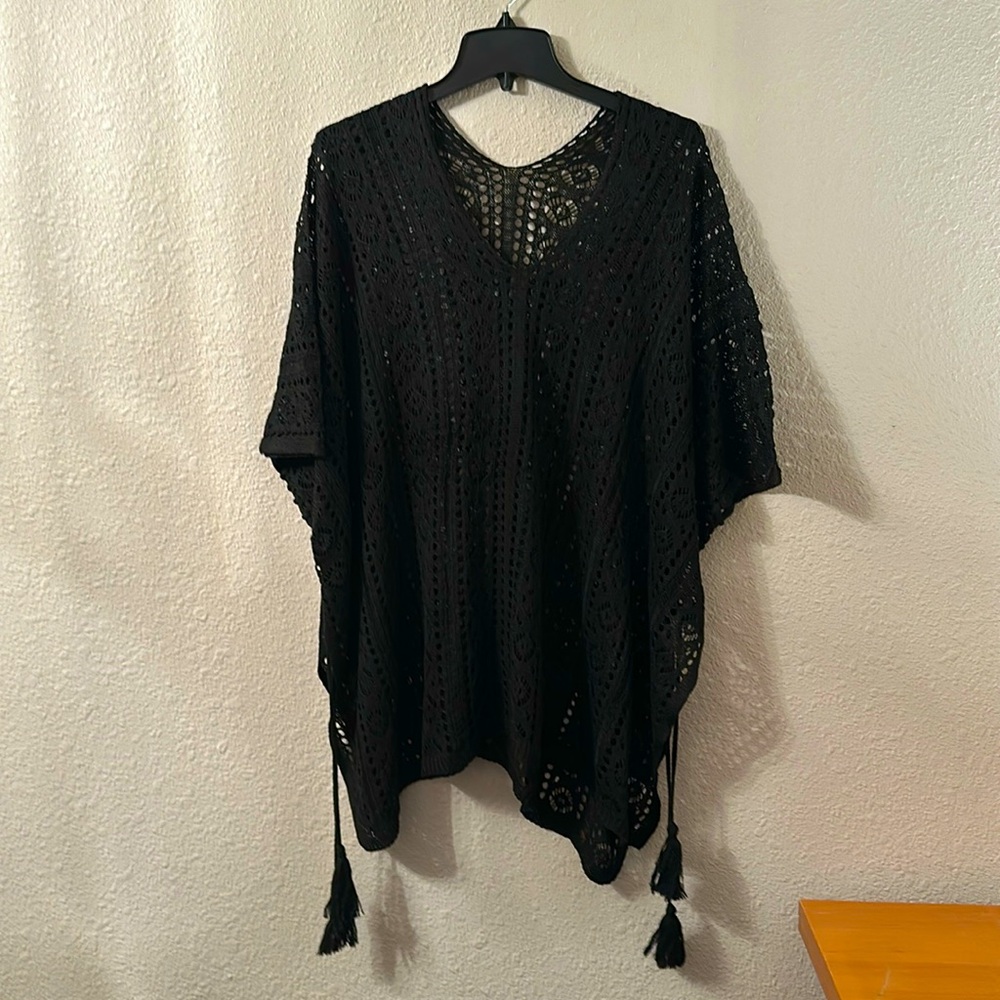 Lightweight crochet shawl with tassel ties on each side worn once